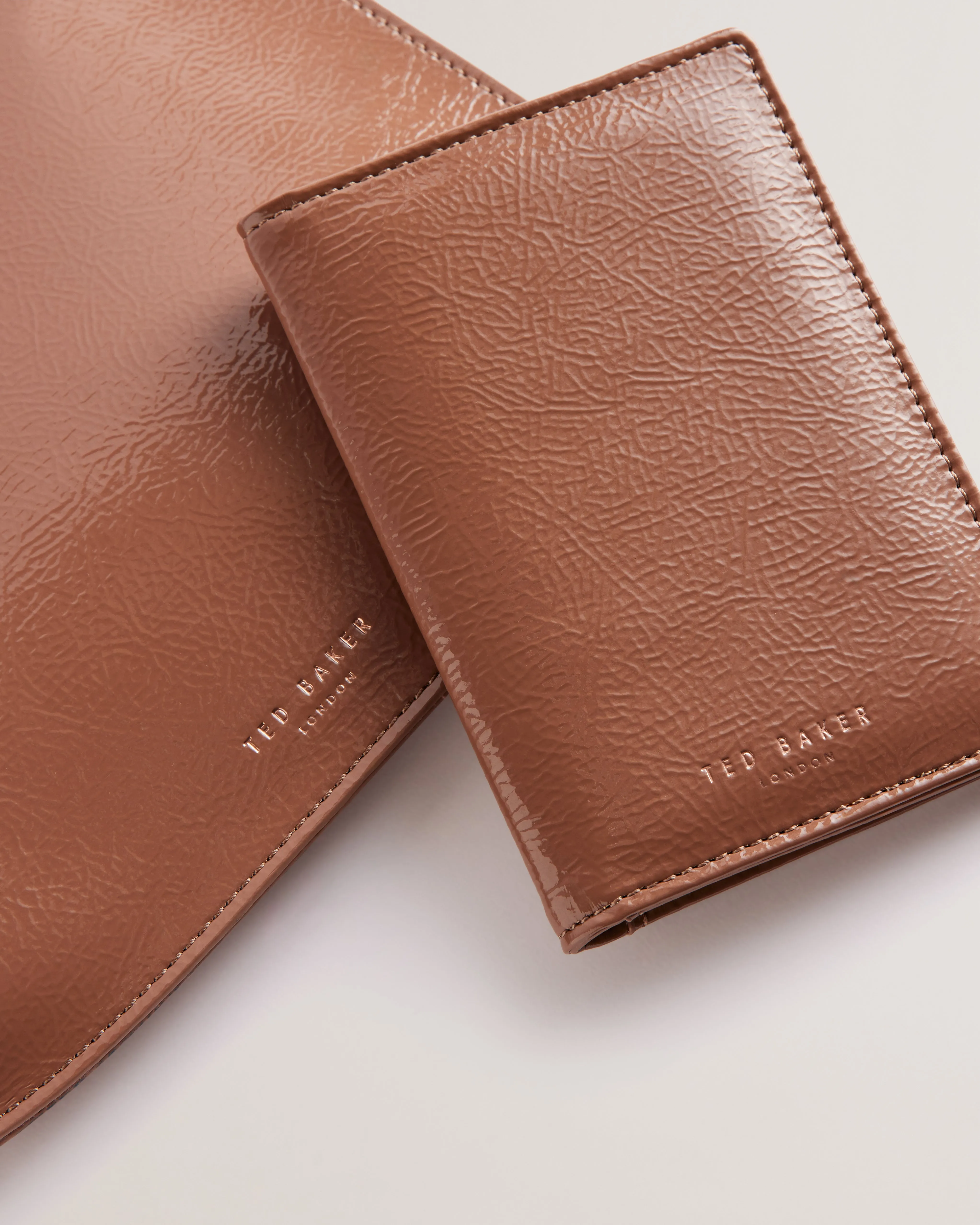 Kelliis Crinkle Patent Pouch And Passport Taupe