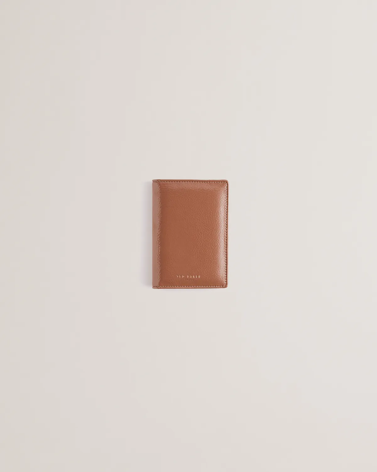 Kelliis Crinkle Patent Pouch And Passport Taupe